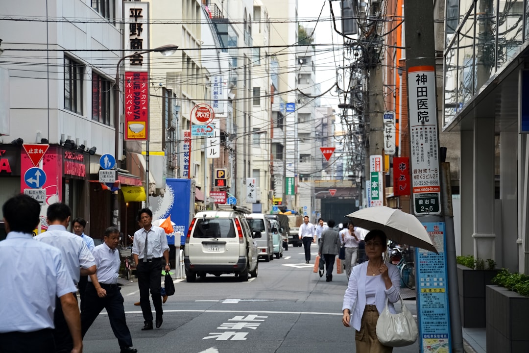 people walking on pedestrian lane during daytime