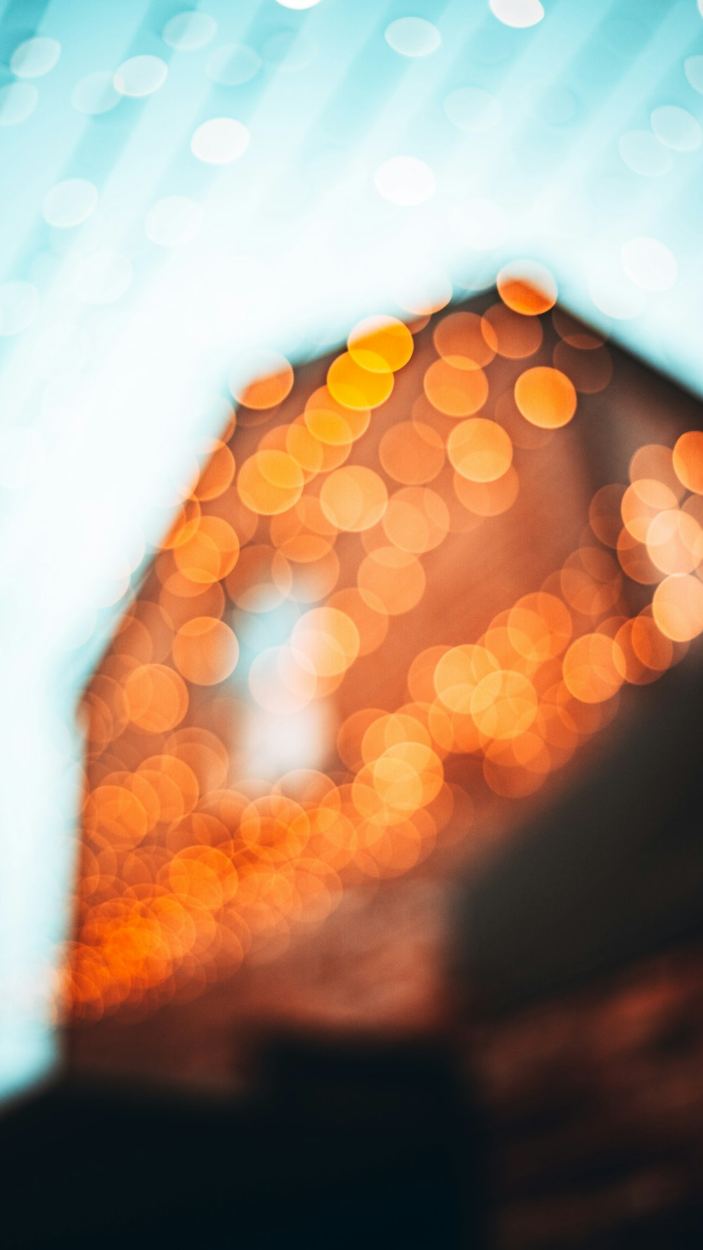 orange and white bokeh lights