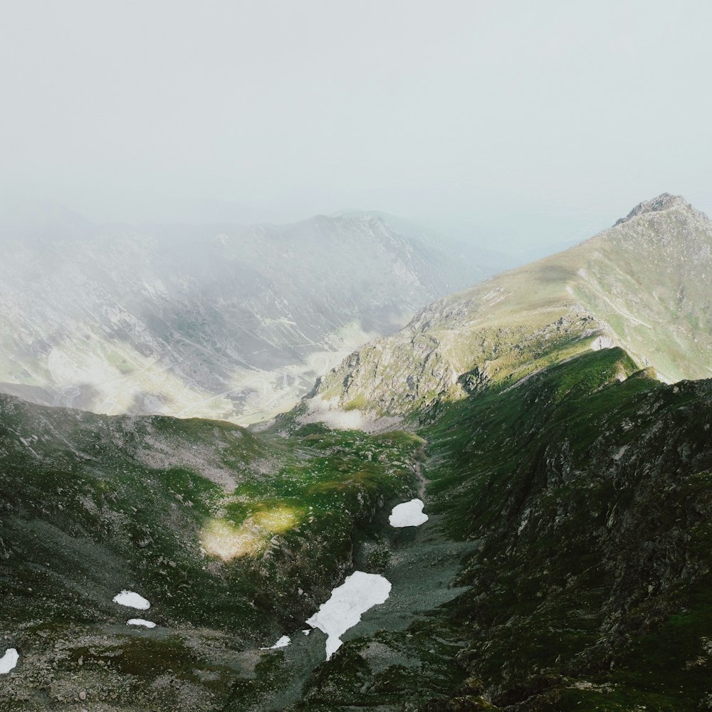 green mountains under white sky during daytime