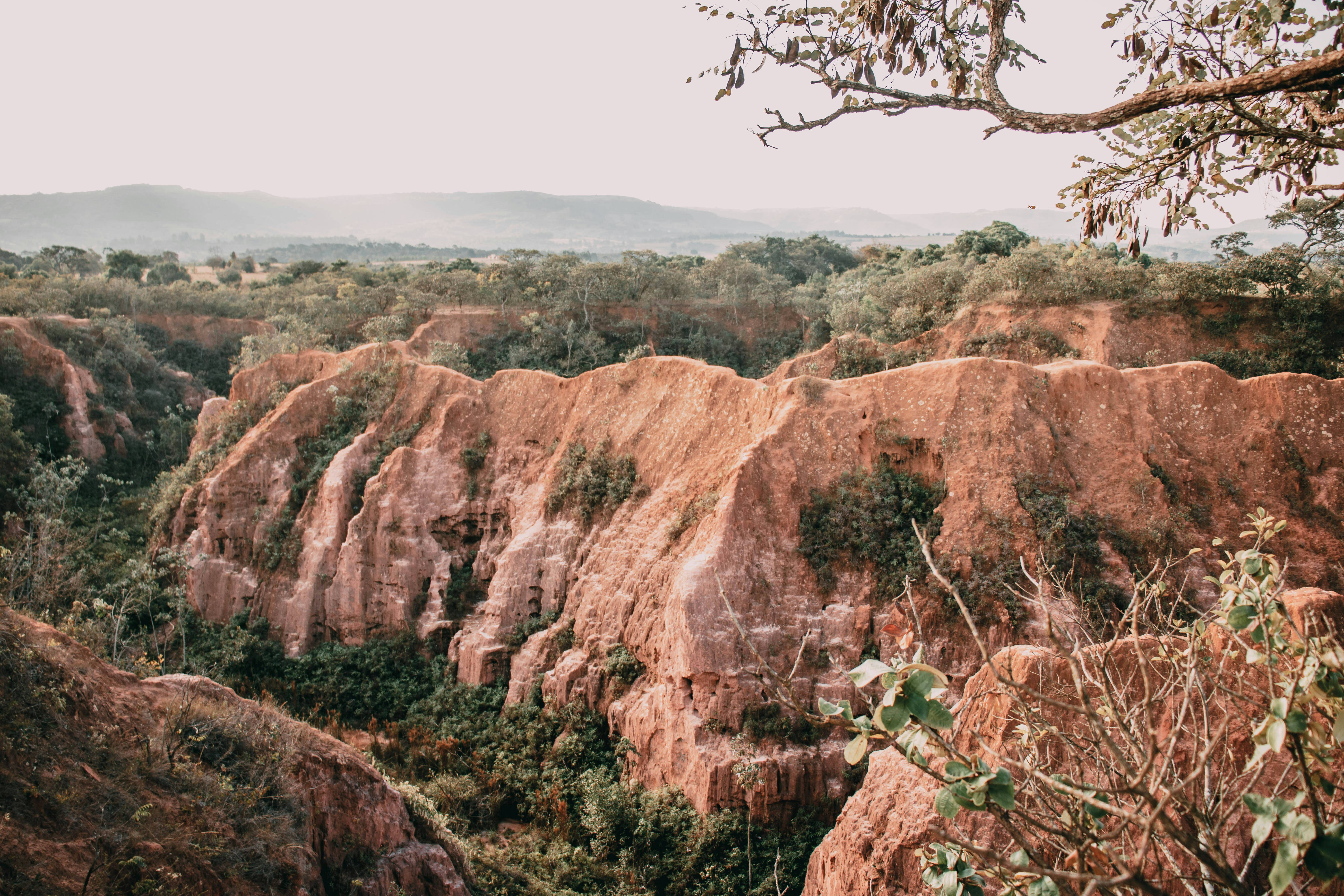 brown rocky mountain under white sky during daytime