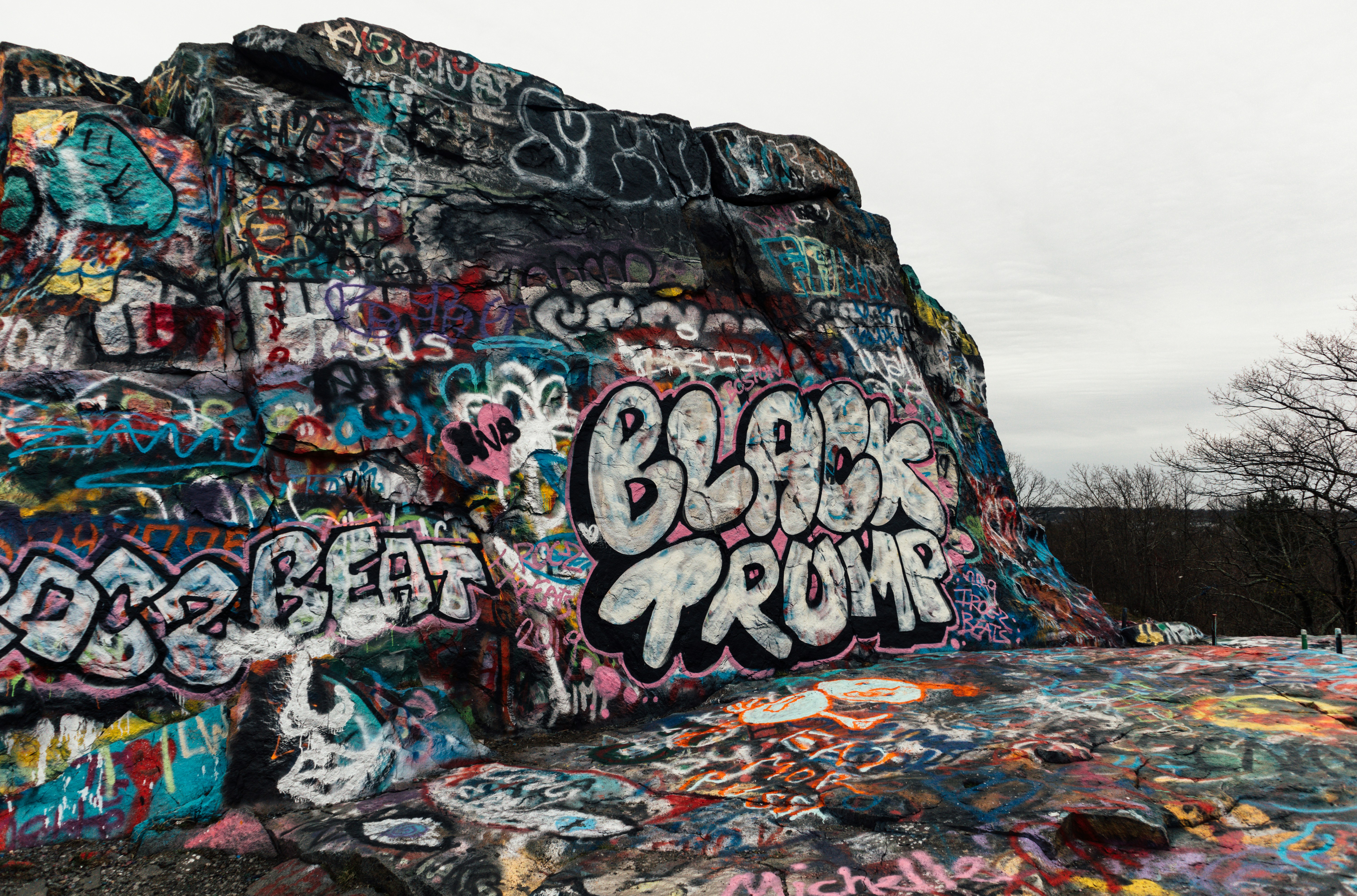 gray and black rock formation under white sky during daytime