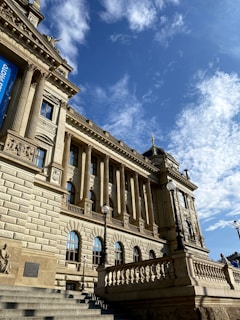 brown concrete building under blue sky during daytime