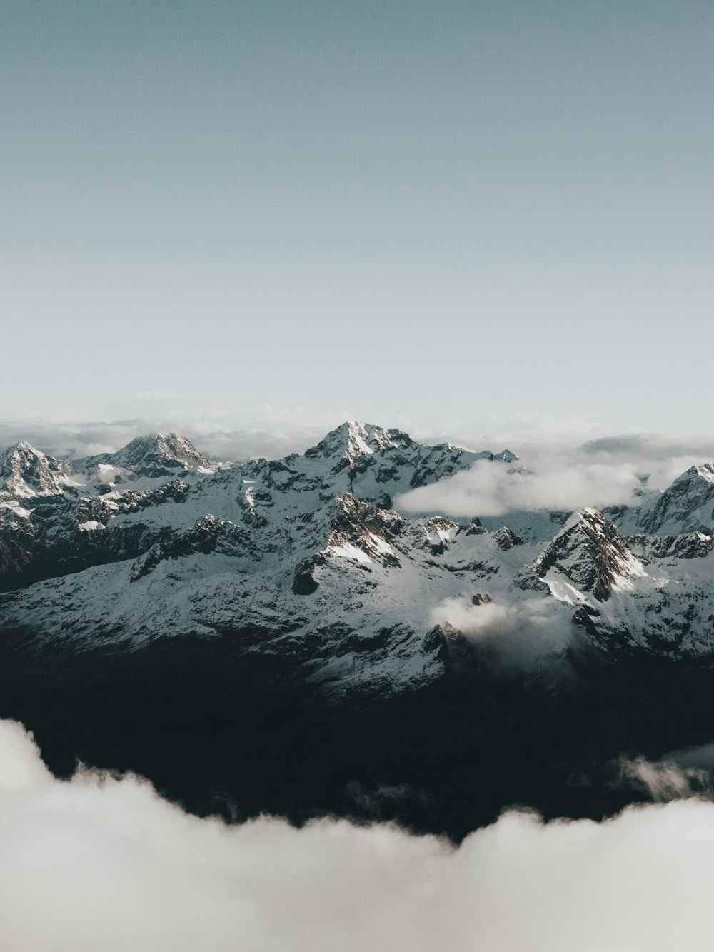 snow covered mountain during daytime