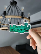 person holding green and white happy st patricks day signage