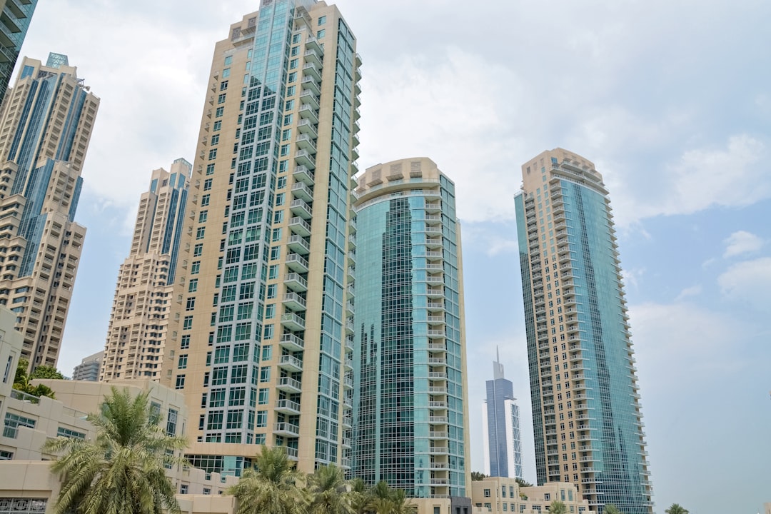 white and blue high rise buildings