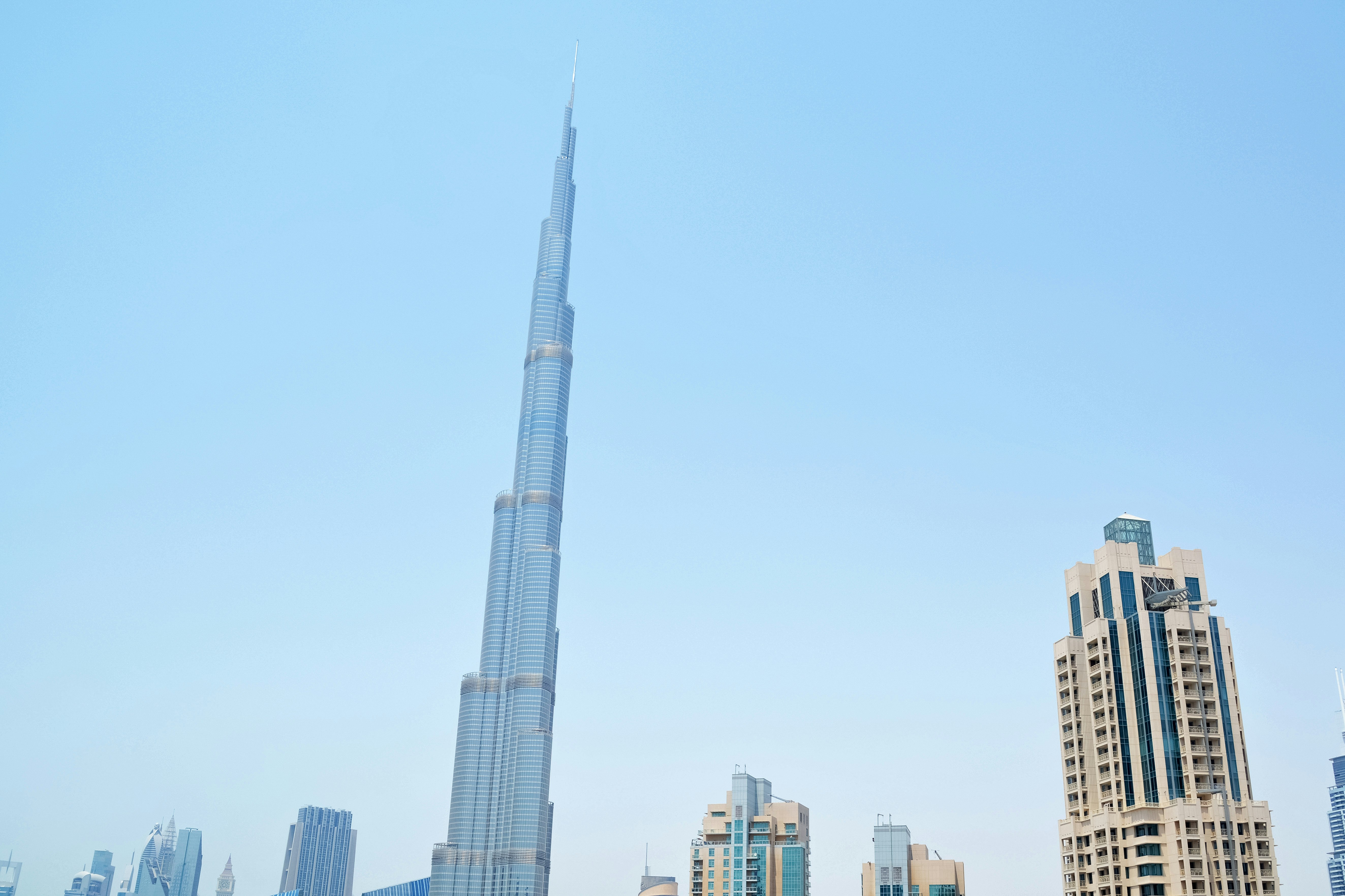 city skyline under blue sky during daytime