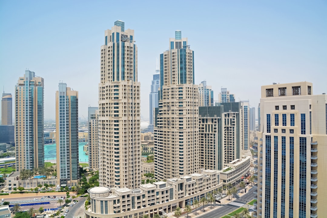 city buildings under blue sky during daytime