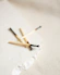 brown and white wooden sticks on white surface