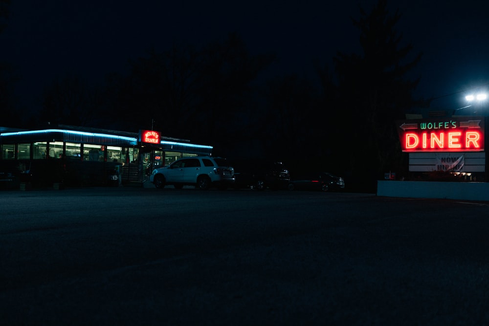 white truck on road during night time