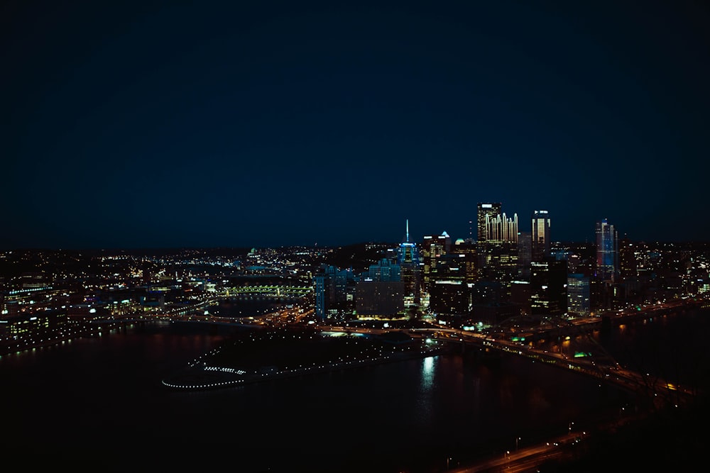 city skyline during night time