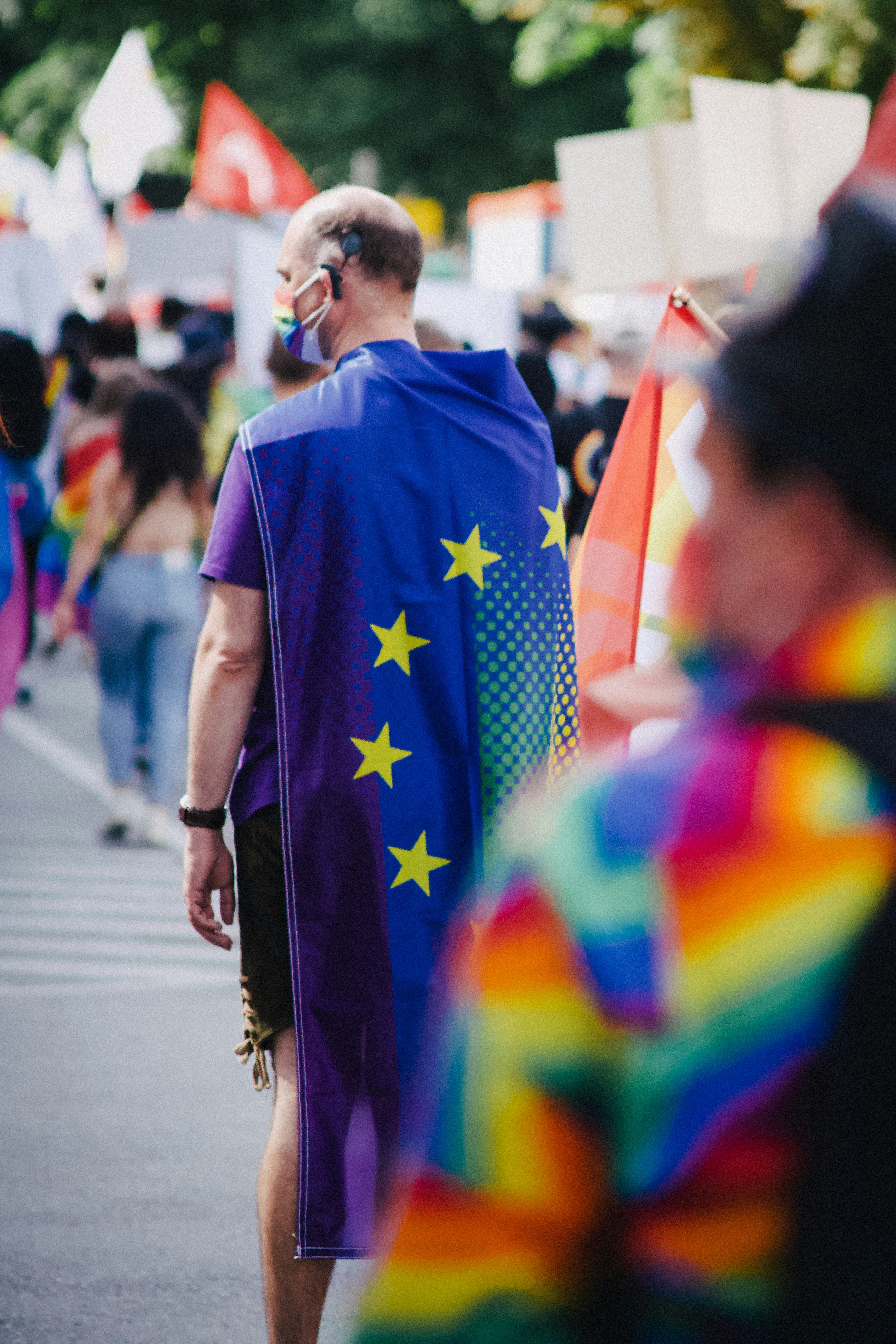 Man with full body European Union flag during Christopher Street Day (CSD) 2021 in Stuttgart, Germany