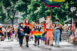 A group of diverse people walking peacefully through Paris streets during the march.