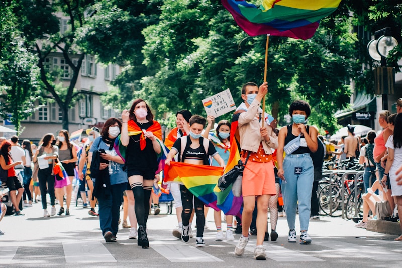 pride community gathering with flags