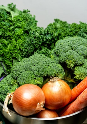 orange pumpkins and green vegetable