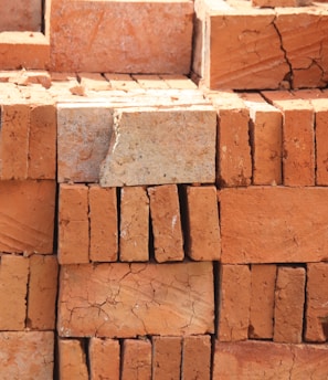 brown brick wall during daytime