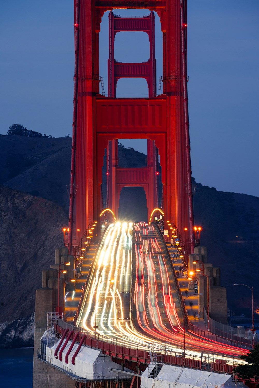 cars on bridge during night time