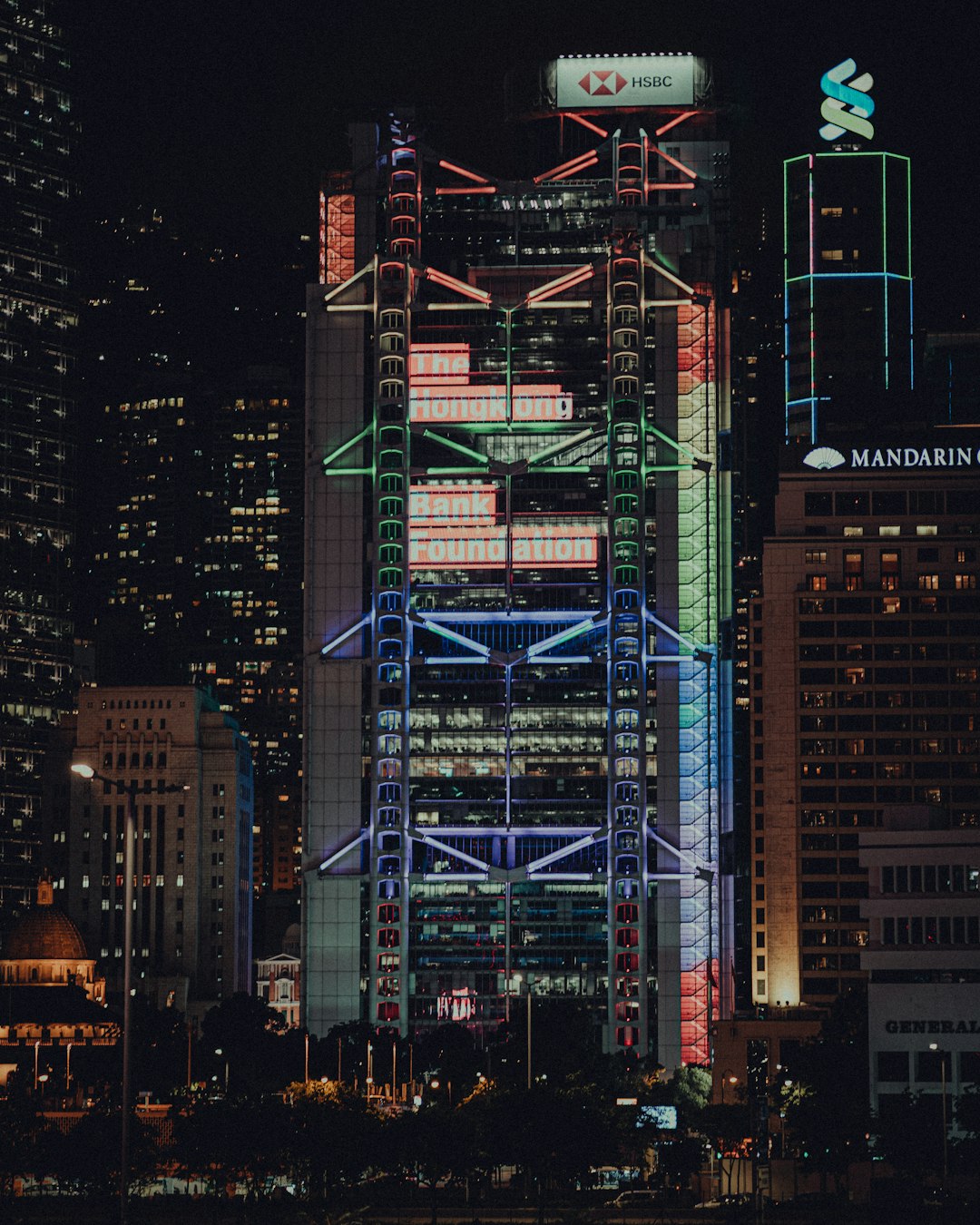 green and black lighted building during night time