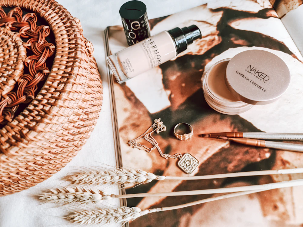 Mineral powder jar and brush in soft light