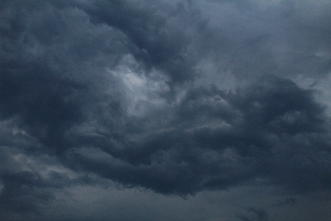 black clouds and blue sky