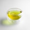 clear glass cup with yellow liquid