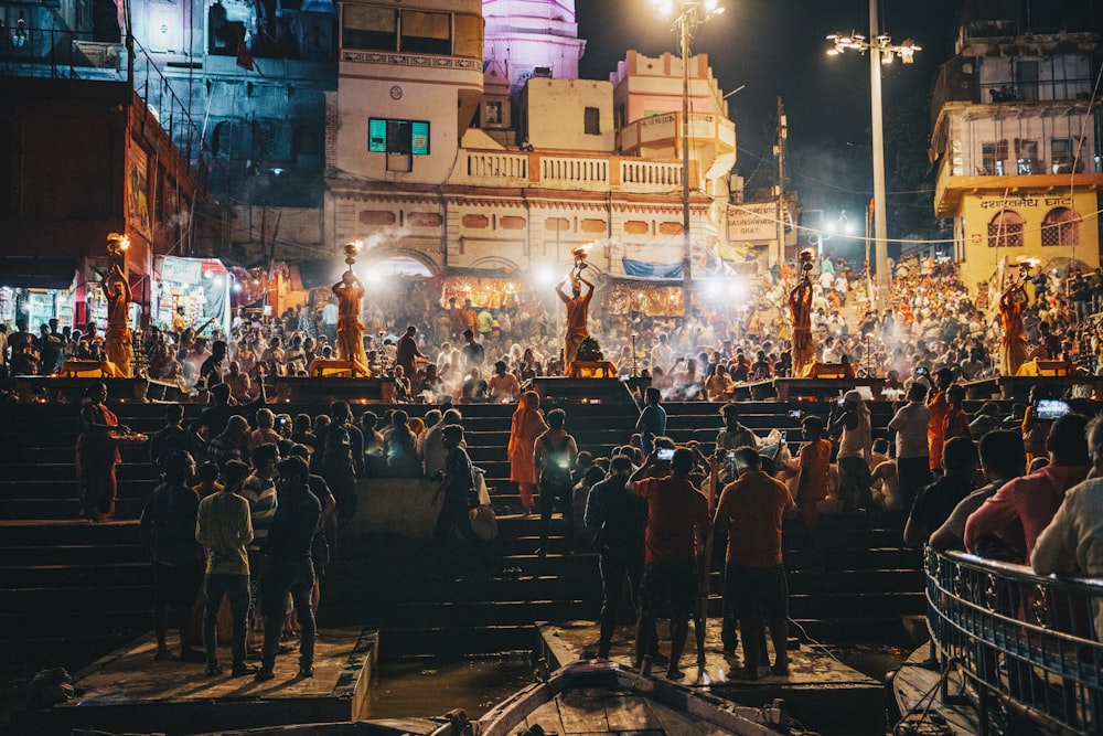 people standing on street during night time