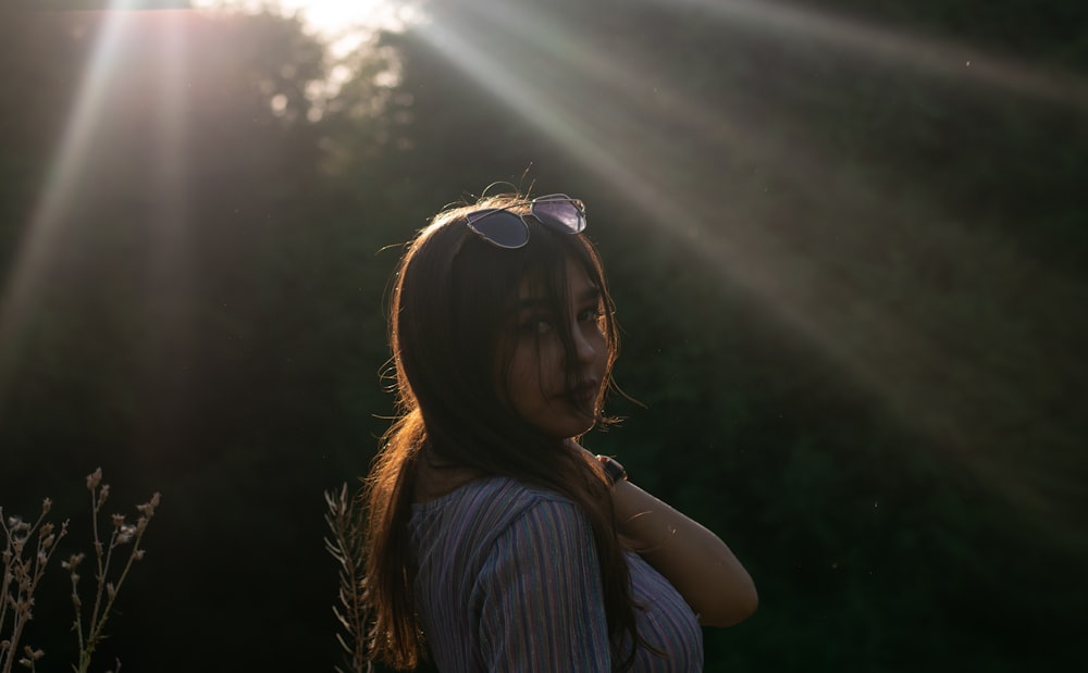 woman in blue and white striped shirt