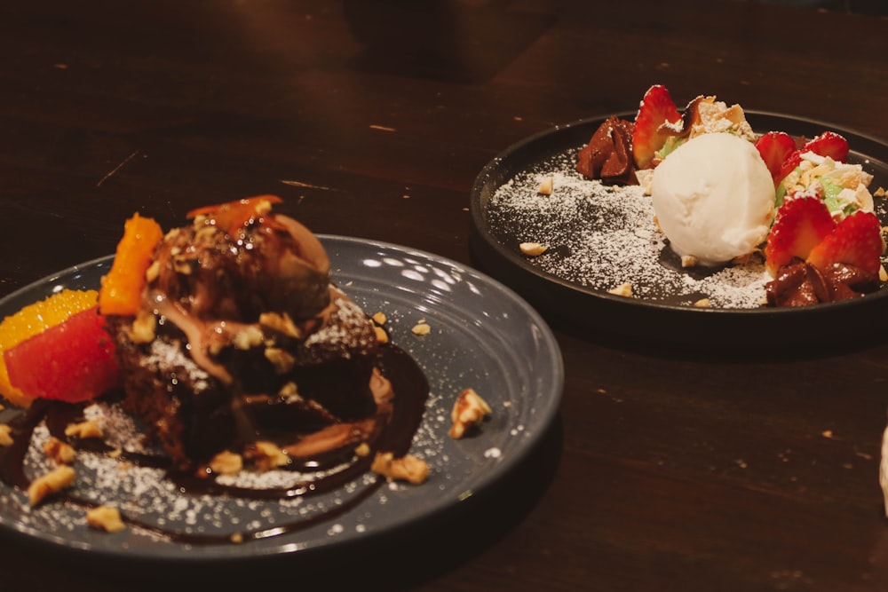 brown and white pastry on black round plate