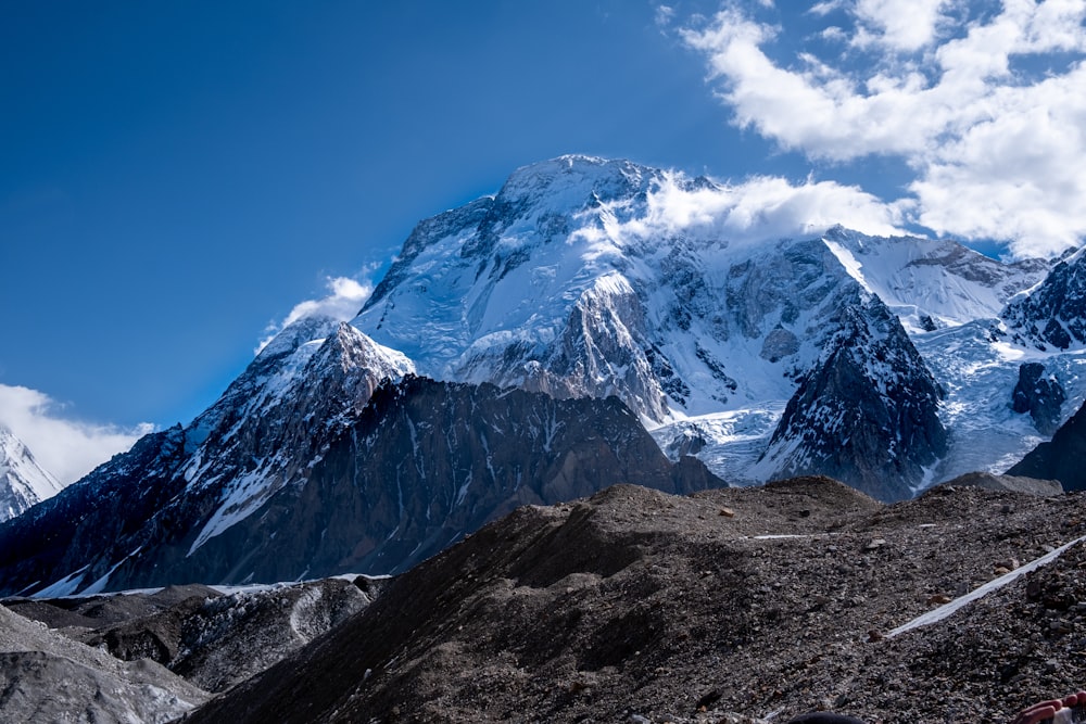 snow covered mountain under blue sky during daytime