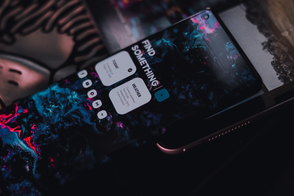black android smartphone displaying icons