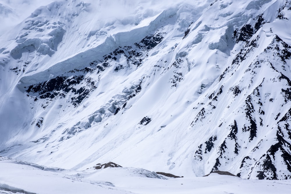 snow covered mountain during daytime