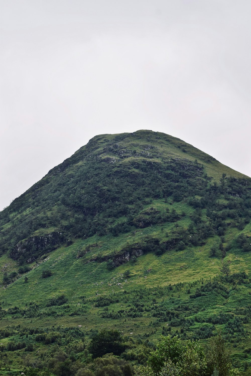 green mountain under white sky during daytime