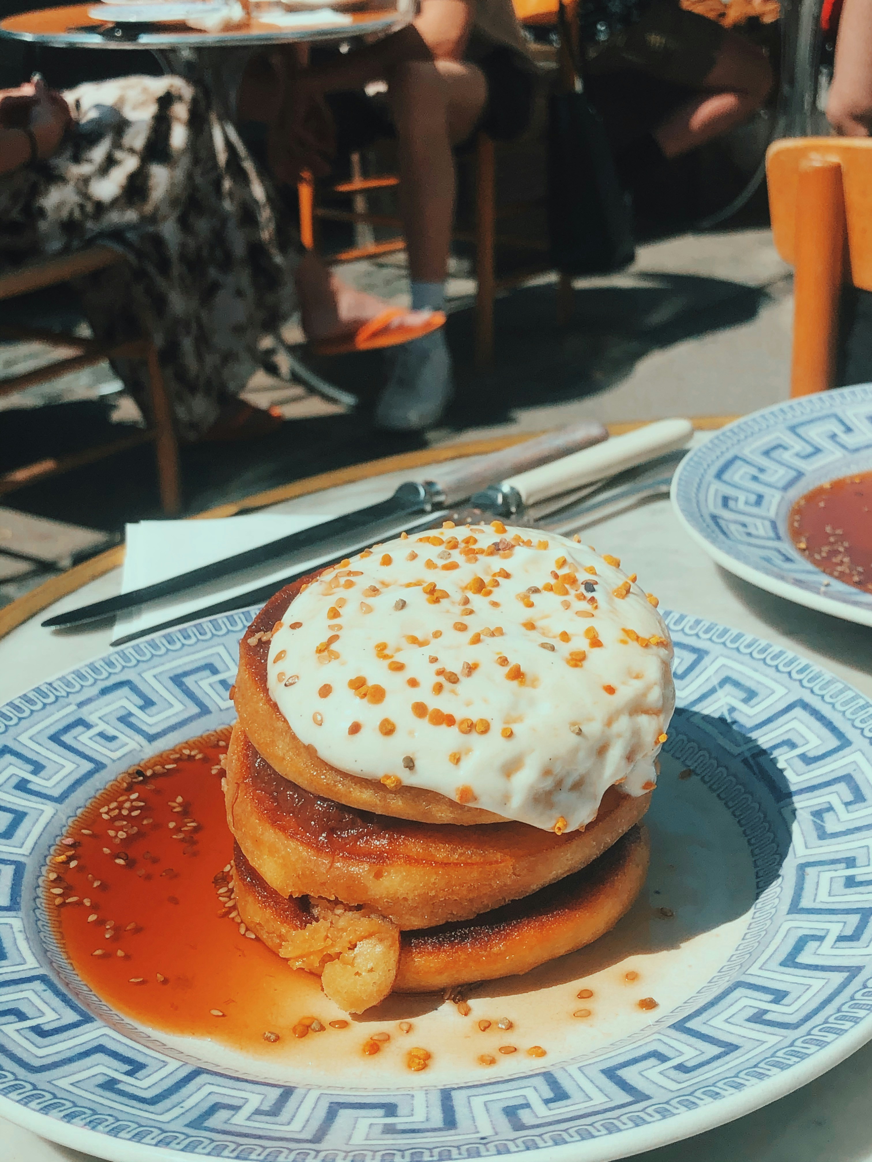 burger on white and blue ceramic plate