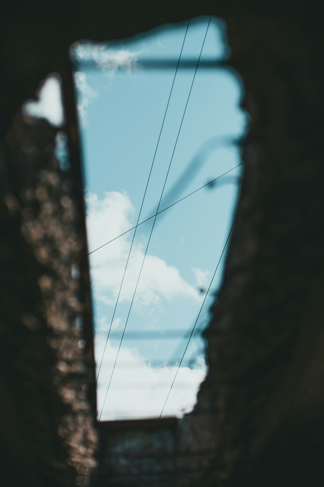 black cable wire under blue sky during daytime