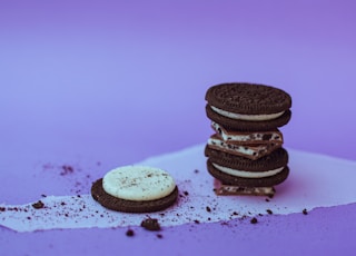 chocolate cookies on white surface