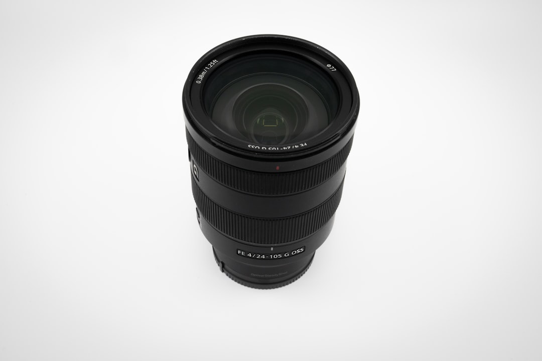 black camera lens on white surface