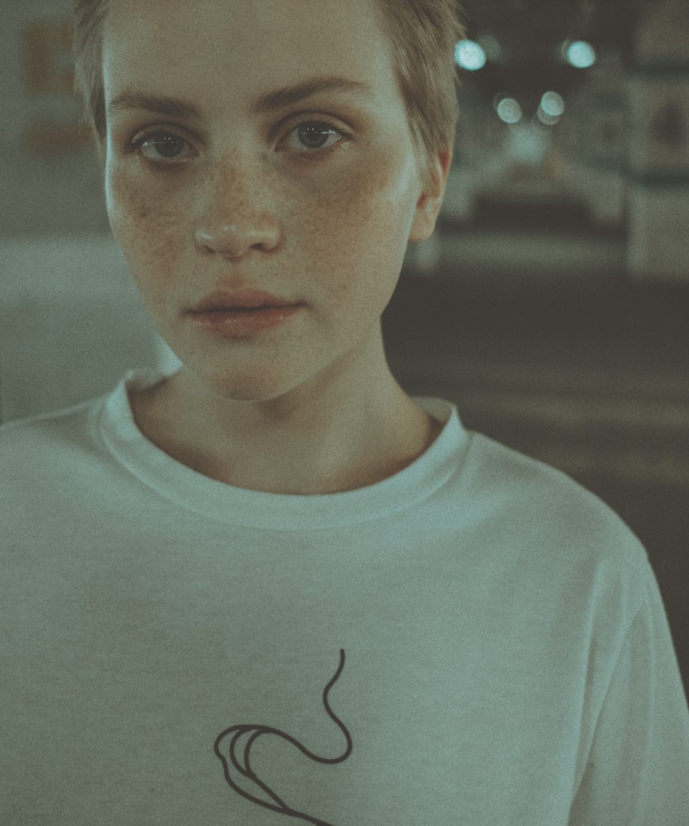 boy in white crew neck shirt