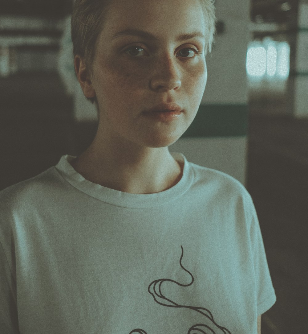 boy in white crew neck shirt