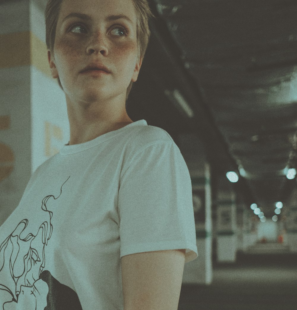 woman in white crew neck t-shirt