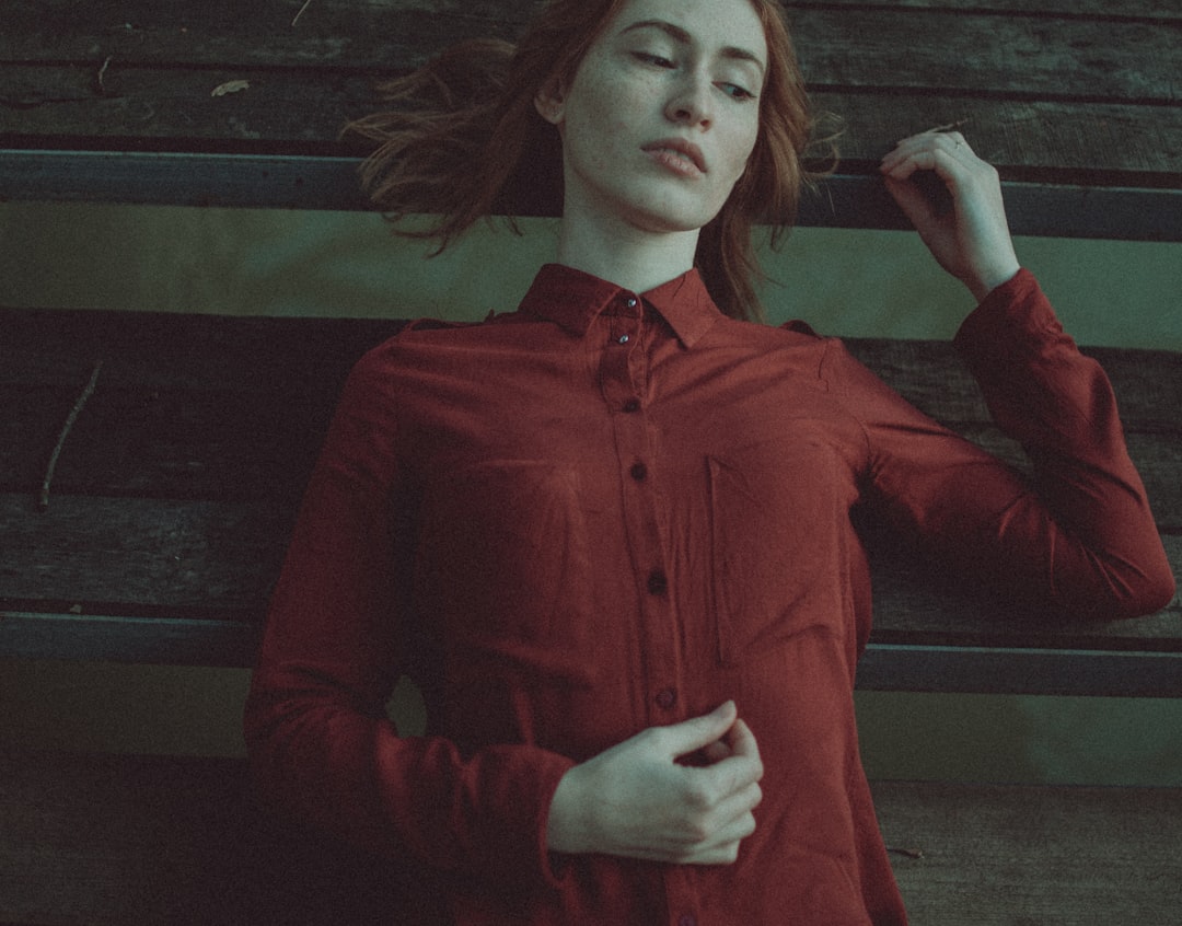 woman in red dress shirt