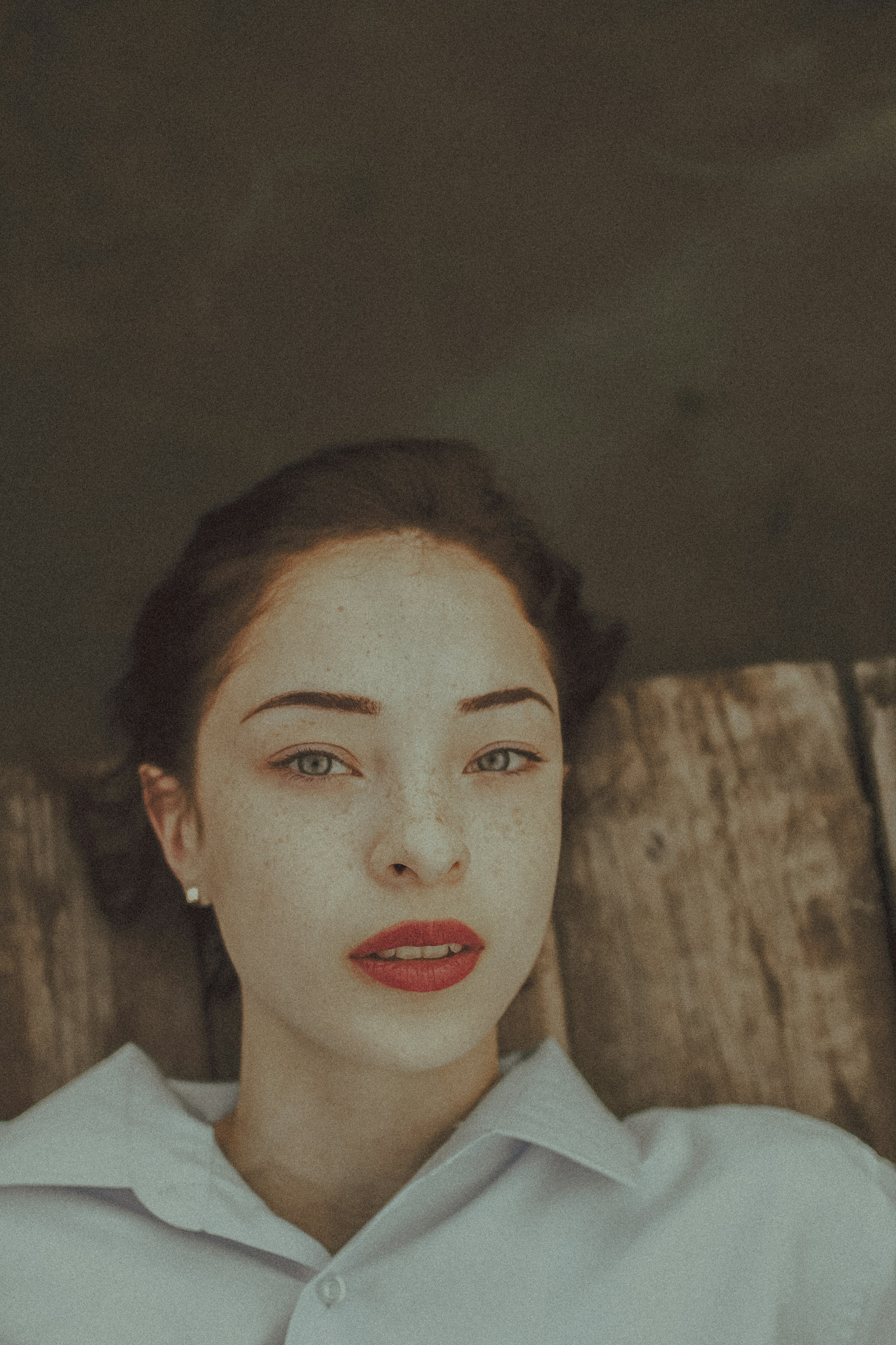 woman in white collared shirt