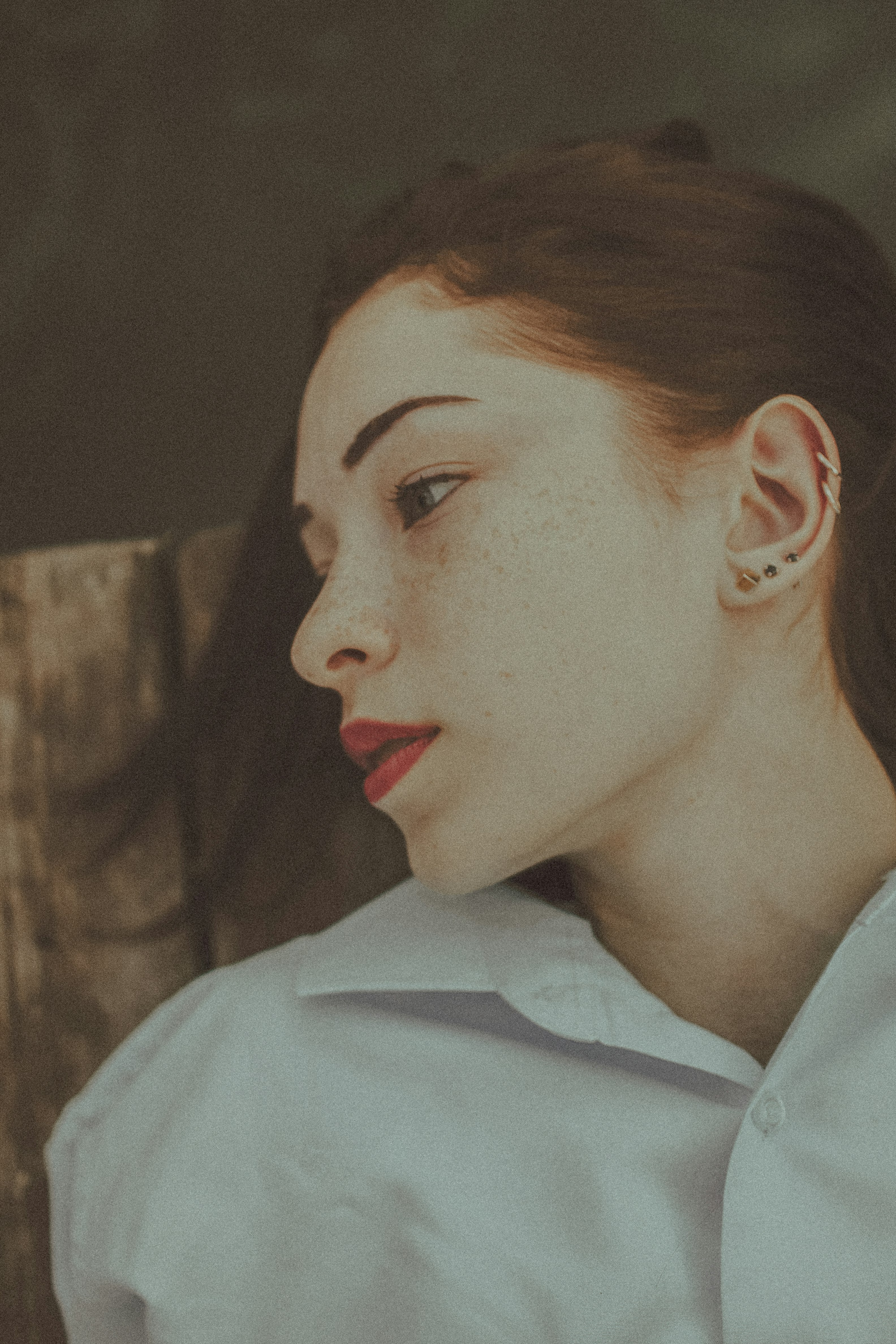 woman in white collared shirt