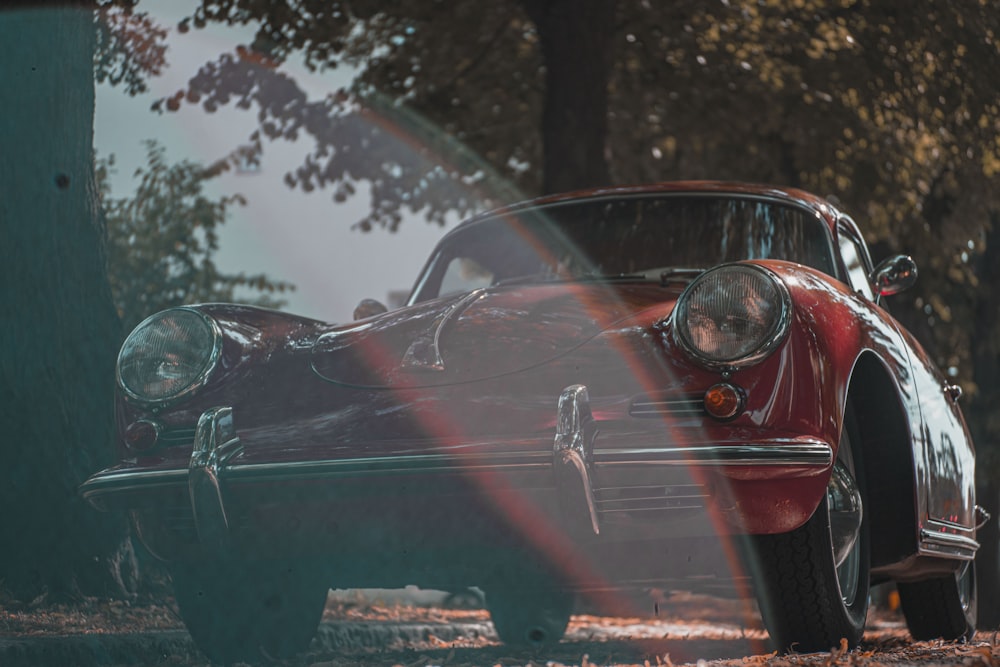 red car on road during daytime