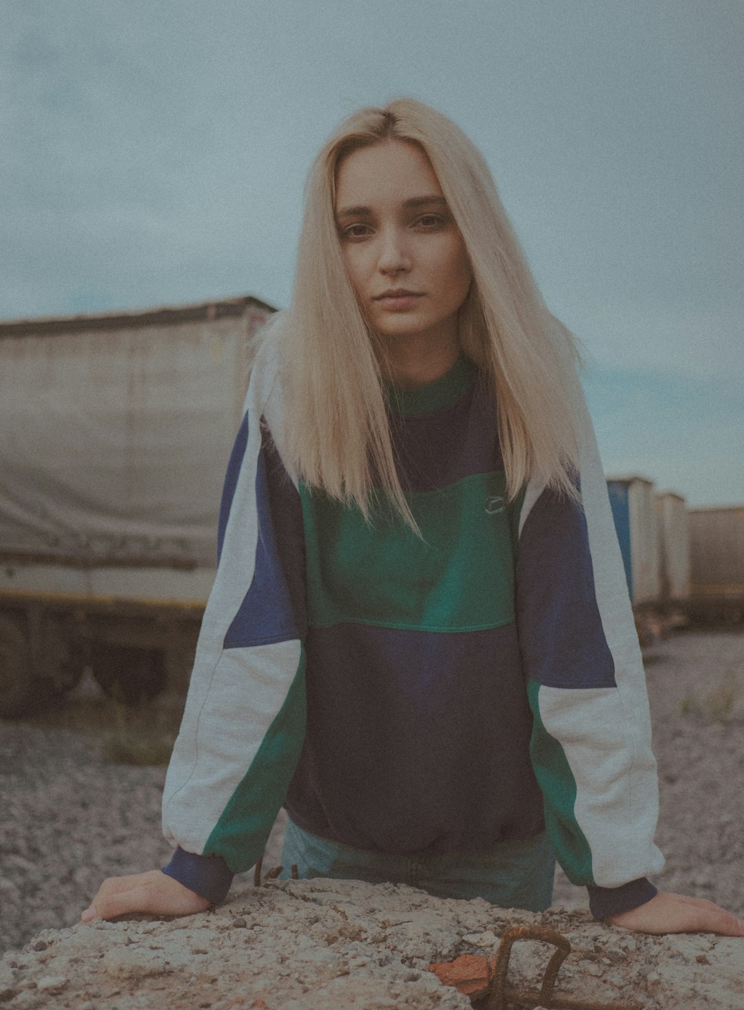 woman in green and white long sleeve shirt
