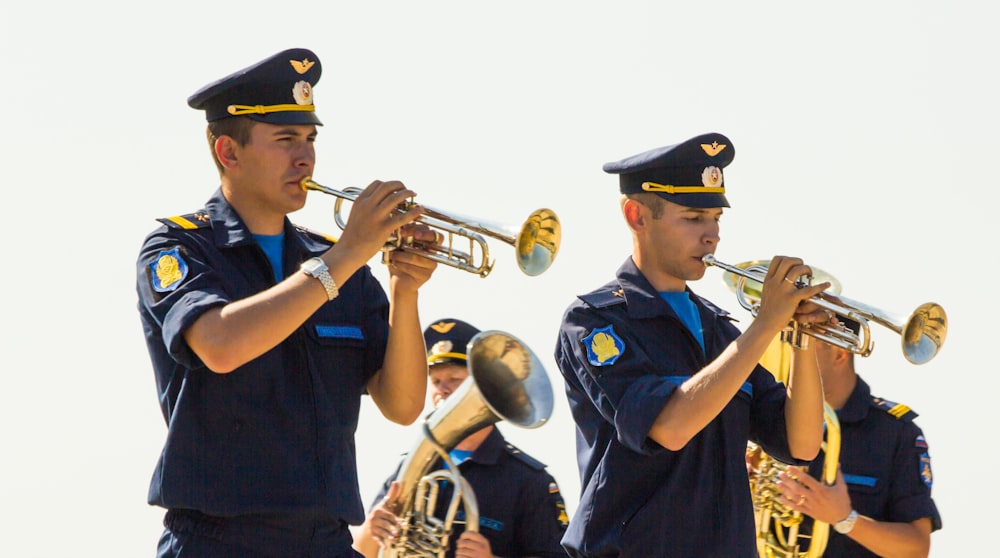 people playing musical instrument during daytime