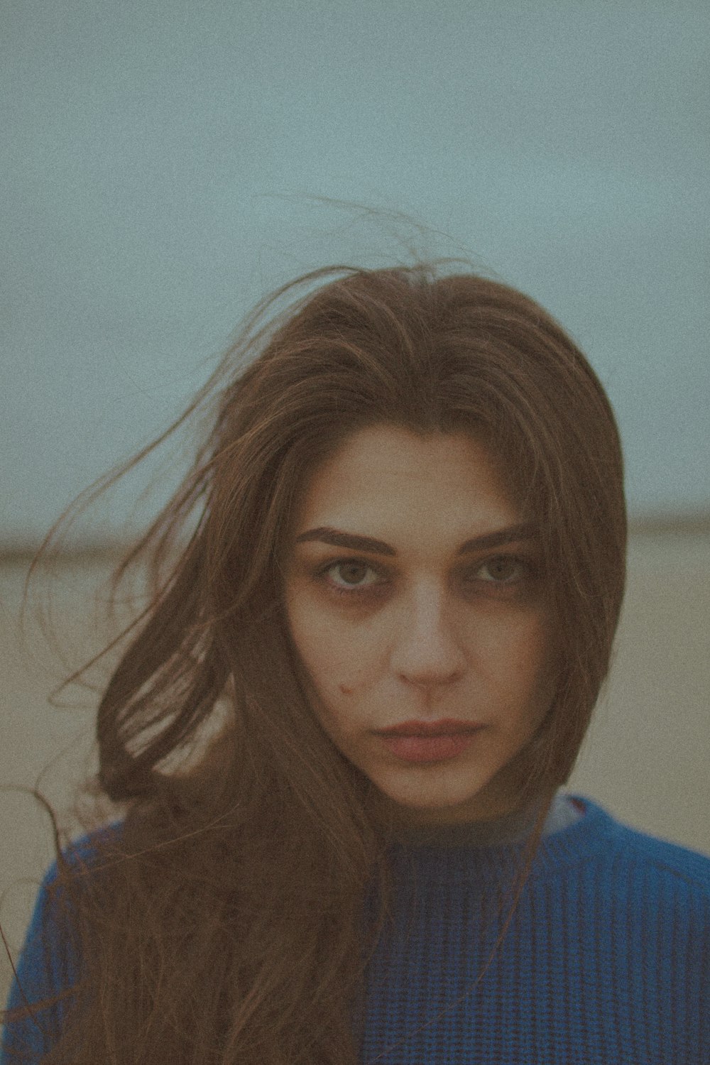 woman in blue crew neck shirt