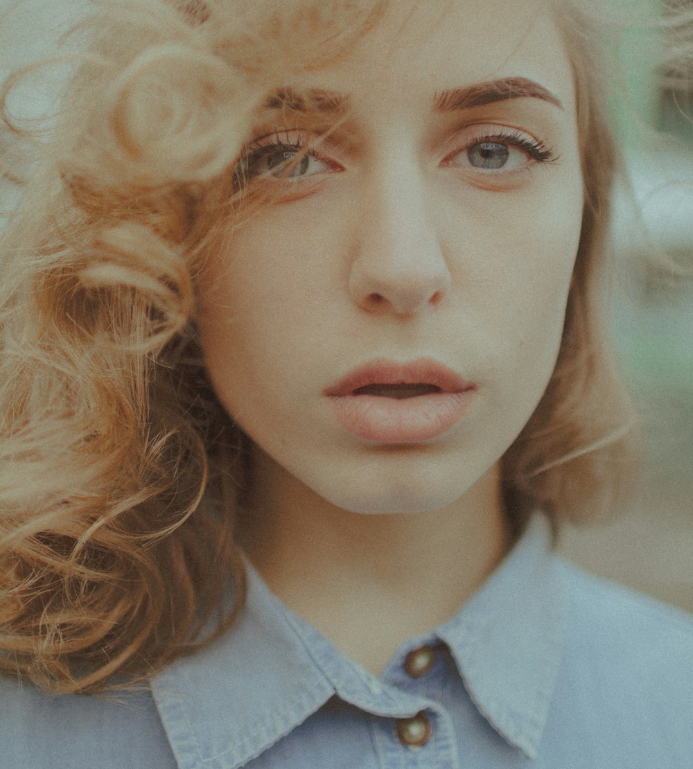 woman in white collared shirt