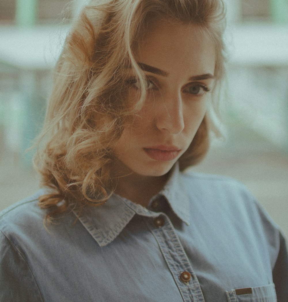 woman in gray button up shirt