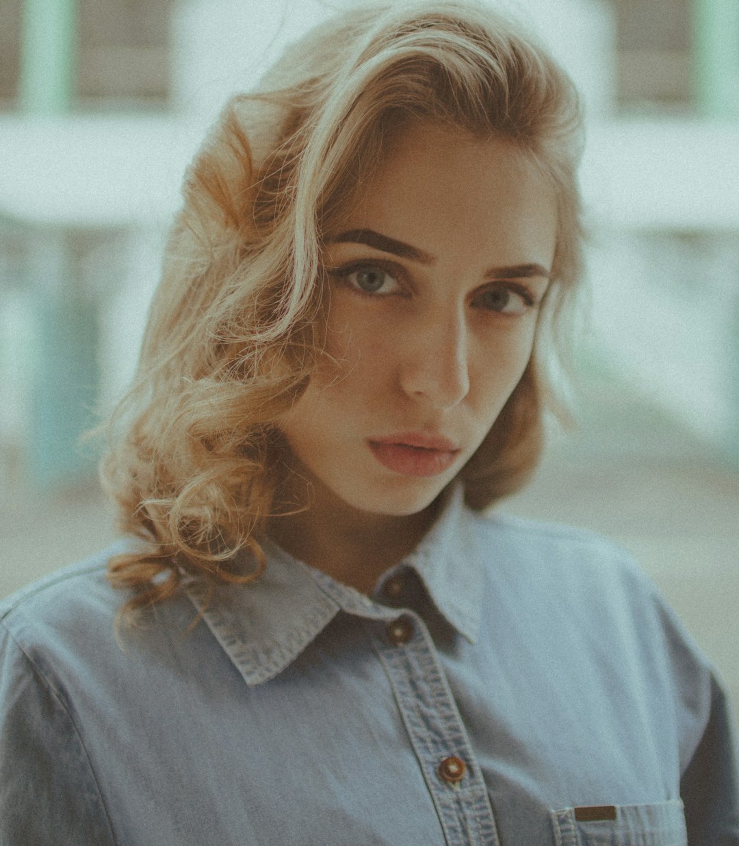 woman in gray button up shirt