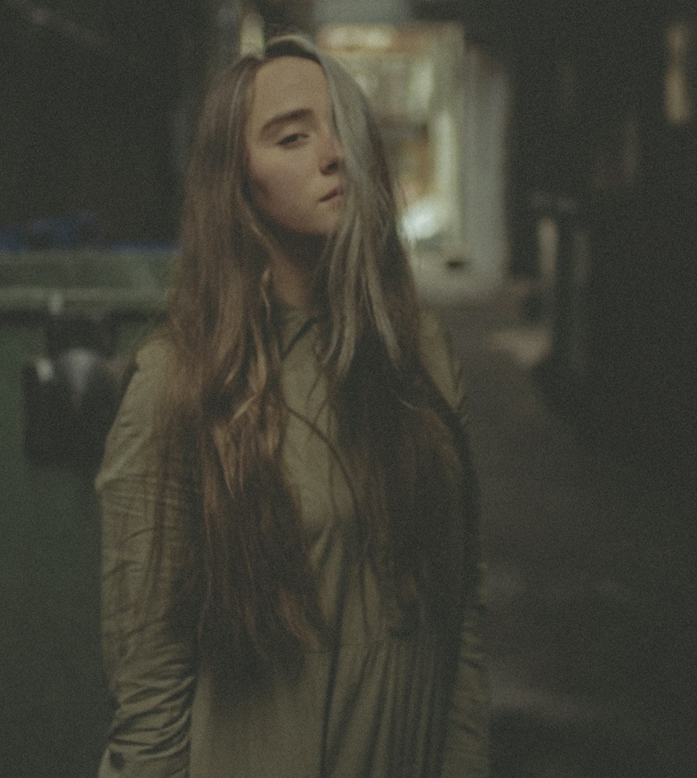 woman in gray long sleeve shirt