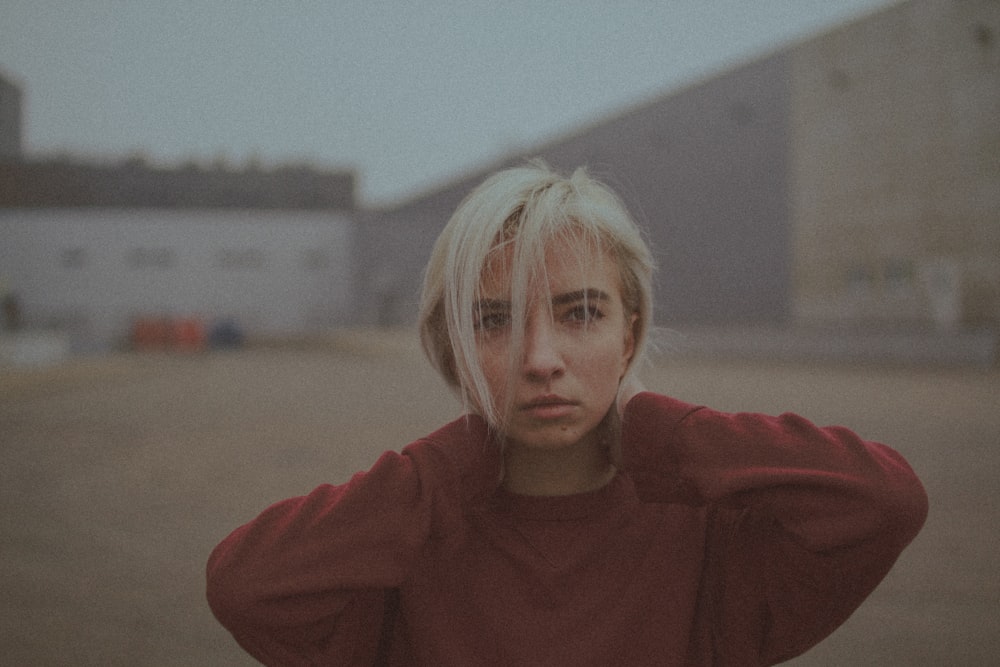 woman in red turtleneck sweater